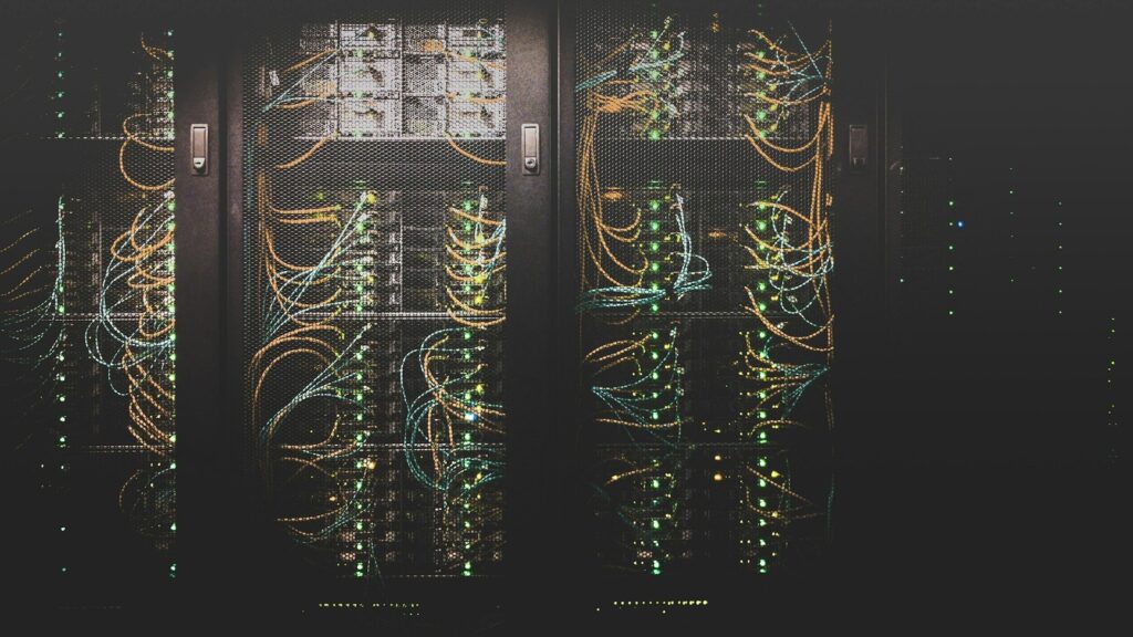 Server racks representing an on-premises print-management application server that should not be exposed to the public internet